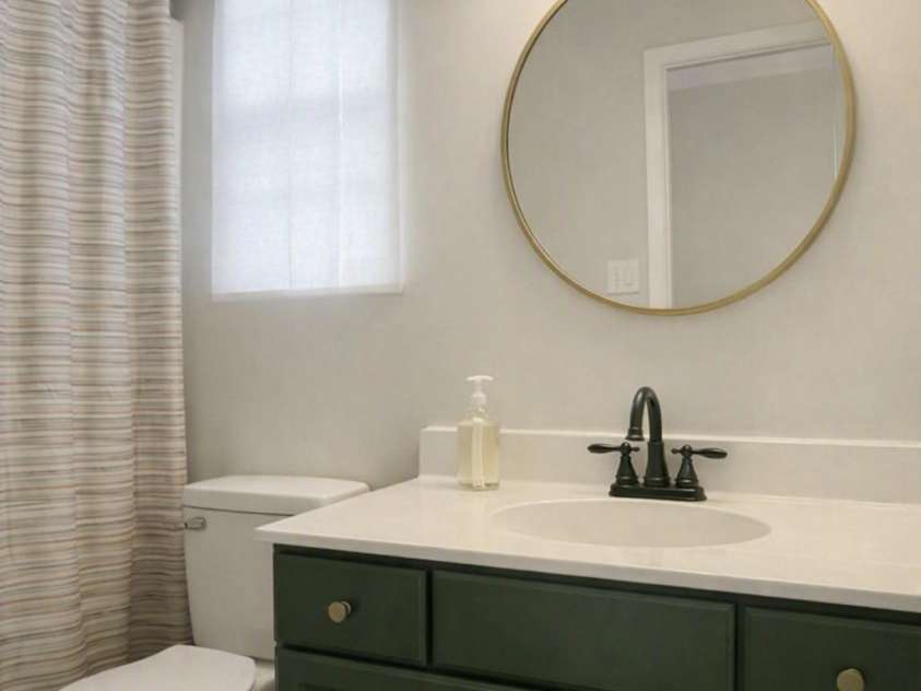 9206 Rotherham Lane, Charlotte, NC 28216.  MLS# CAR4419892, YatesRealty ID 48102. Pretty modern looking full bathroom, digitally enhanced