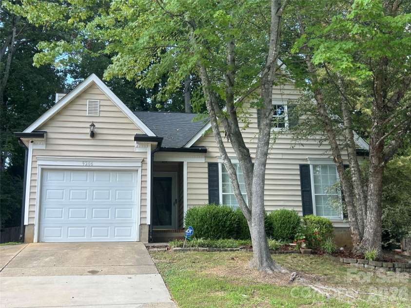 9206 Rotherham Lane, Charlotte, NC 28216.  MLS# CAR4419892, YatesRealty ID 48102. Pretty ranch with mature trees