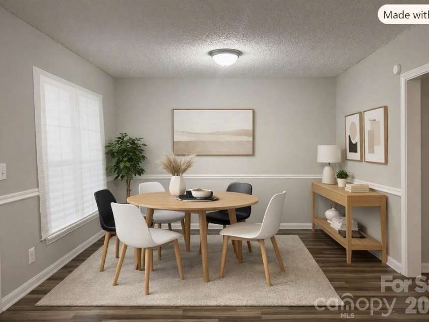 9206 Rotherham Lane, Charlotte, NC 28216.  MLS# CAR4419892, YatesRealty ID 48102. Staged Dining Area