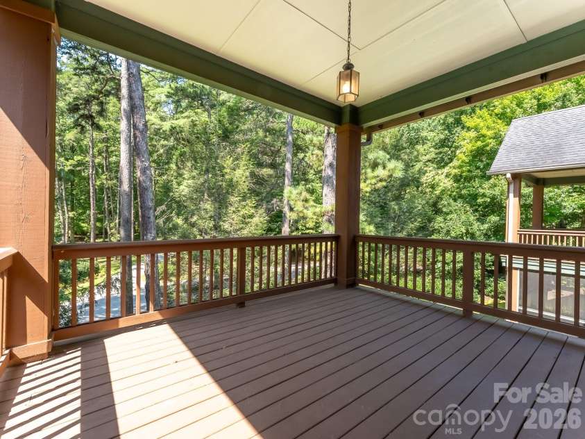 47 Ridgetop Circle, Brevard, NC 28712.  MLS# CAR4414637, YatesRealty ID 48104. Covered Back Deck