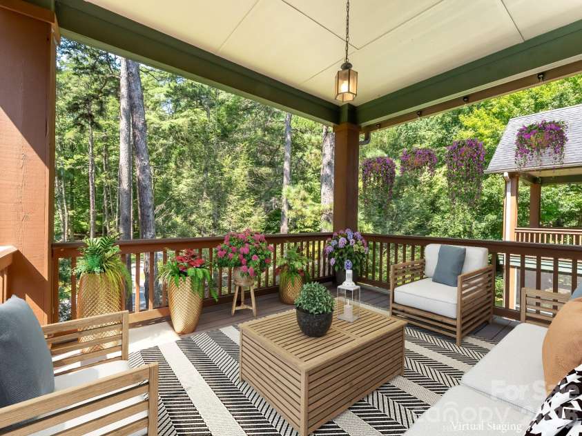 47 Ridgetop Circle, Brevard, NC 28712.  MLS# CAR4414637, YatesRealty ID 48104. Covered Back Deck