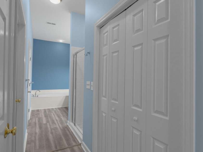 47 Ridgetop Circle, Brevard, NC 28712.  MLS# CAR4414637, YatesRealty ID 48104. Primary Ensuite Bathroom and Closets