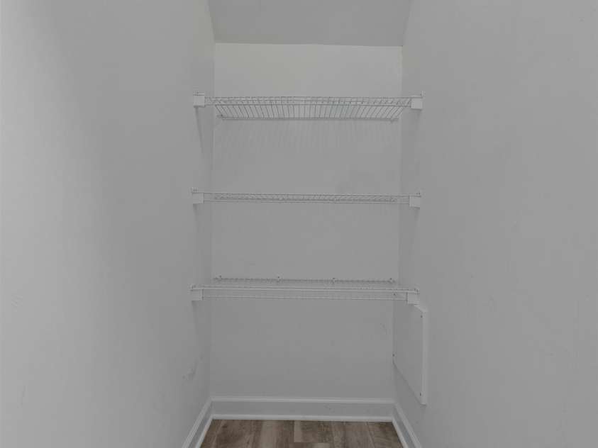 47 Ridgetop Circle, Brevard, NC 28712.  MLS# CAR4414637, YatesRealty ID 48104. Under-Stairs Storage Closet