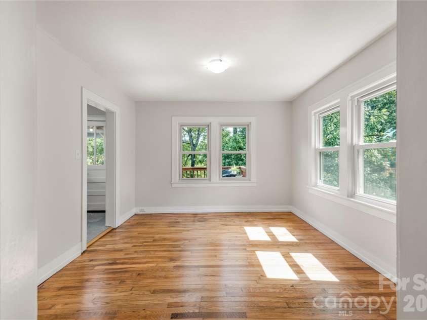 462 Sand Hill Road, Asheville, NC 28806.  MLS# CAR4419518, YatesRealty ID 48105. Dining room? Den? You decide!
