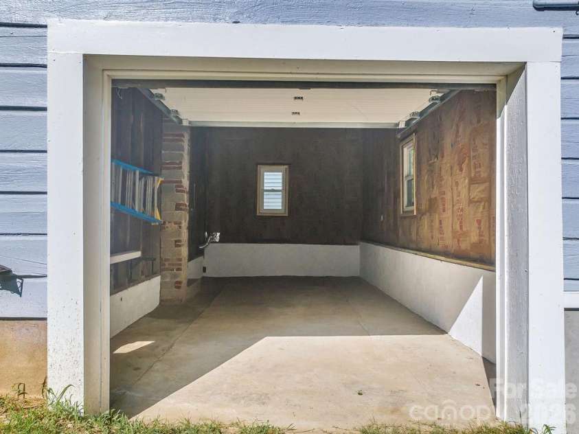 462 Sand Hill Road, Asheville, NC 28806.  MLS# CAR4419518, YatesRealty ID 48105. Perfect for a workshop, art studio, or parking.