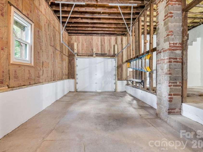 462 Sand Hill Road, Asheville, NC 28806.  MLS# CAR4419518, YatesRealty ID 48105. Single garage in basement.
