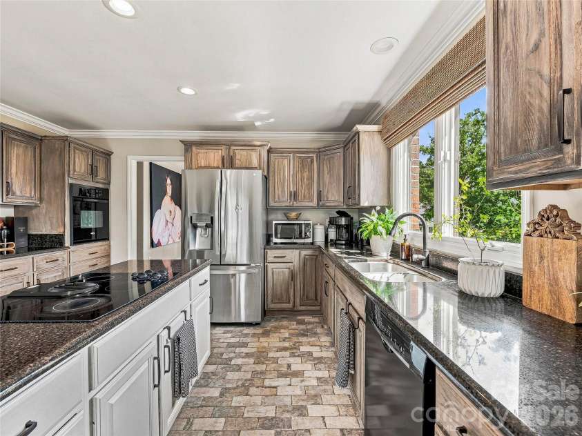 41 Forest Knoll Drive, Weaverville, NC 28787.  MLS# CAR4419379, YatesRealty ID 48108. Funcational layout in the beautiful kitchen.