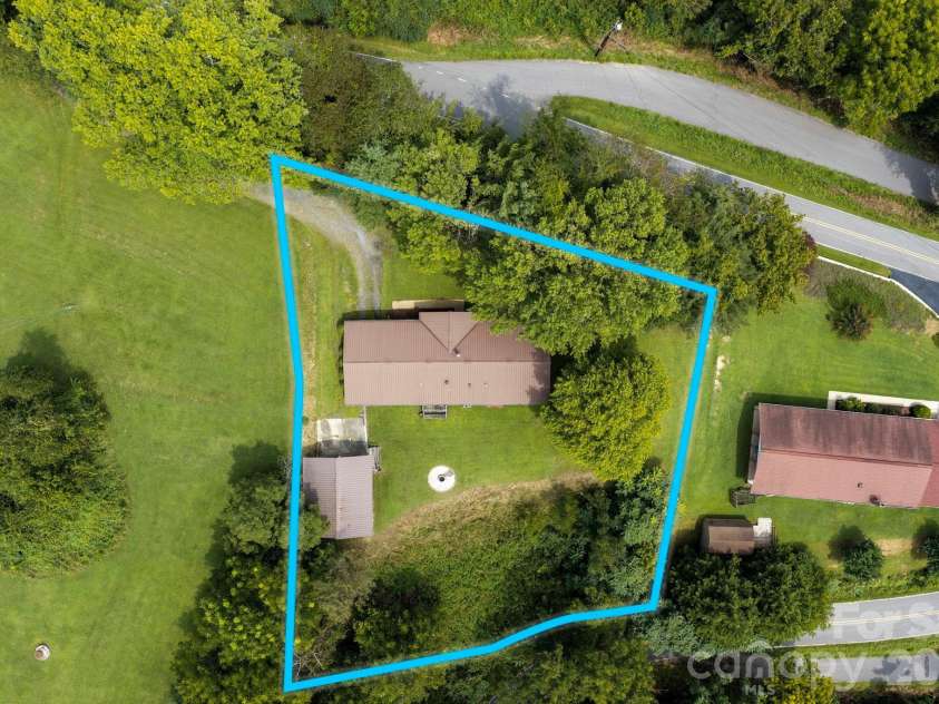 1057 Skyway Drive, Marshall, NC 28753.  MLS# CAR4418857, YatesRealty ID 48112. 0.66 acres in a private location