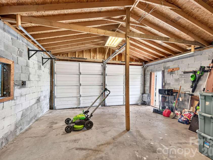 1057 Skyway Drive, Marshall, NC 28753.  MLS# CAR4418857, YatesRealty ID 48112. Double garage doors