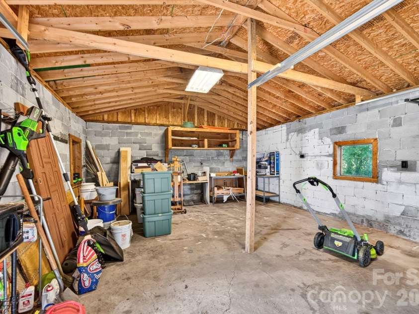 1057 Skyway Drive, Marshall, NC 28753.  MLS# CAR4418857, YatesRealty ID 48112. Lots of a space for whatever your needs are