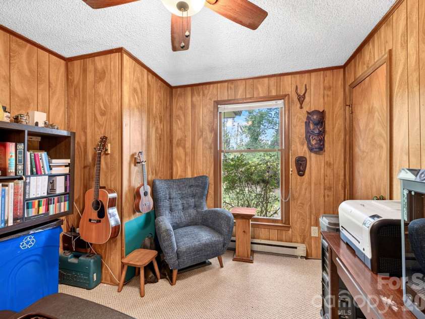 1057 Skyway Drive, Marshall, NC 28753.  MLS# CAR4418857, YatesRealty ID 48112. Smaller 3rd bedroom functions well as an office