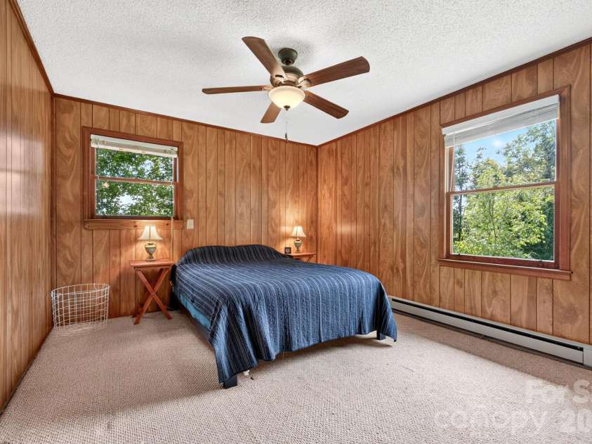 1057 Skyway Drive, Marshall, NC 28753.  MLS# CAR4418857, YatesRealty ID 48112. Spacious primary bedroom