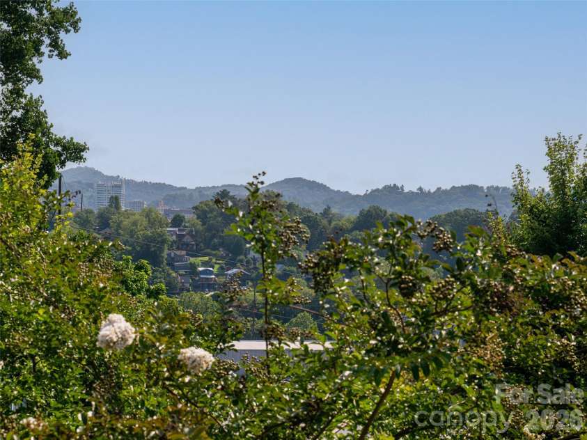 4 Osprey Trail, Asheville, NC 28806.  MLS# CAR4418286, YatesRealty ID 48114. Views off the primary deck