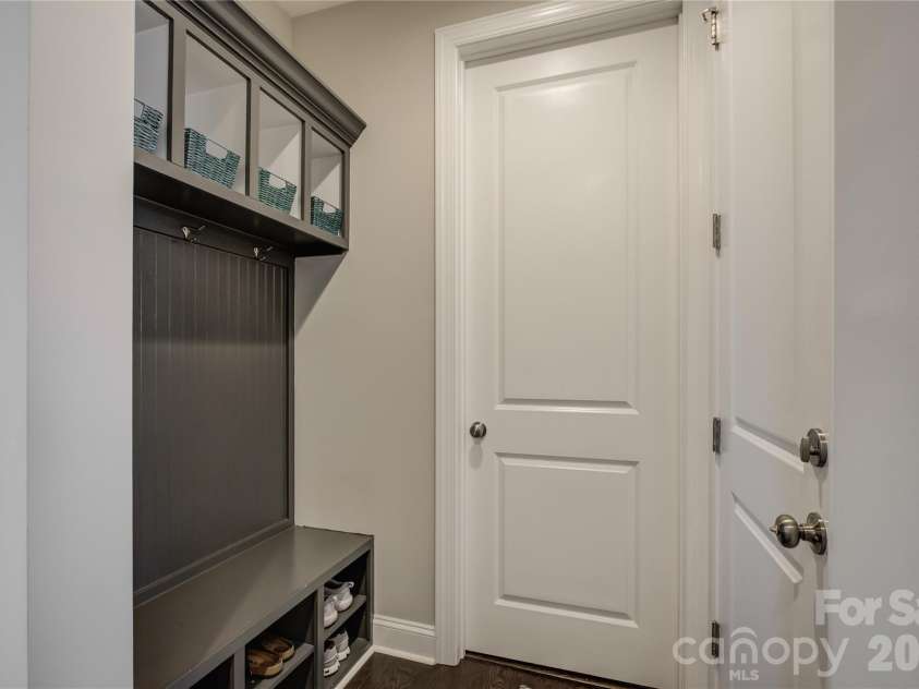 14219 Twin Eagles Lane, Charlotte, NC 28278.  MLS# CAR4418745, YatesRealty ID 48122. Custom-built drop zone with integrated storage.
