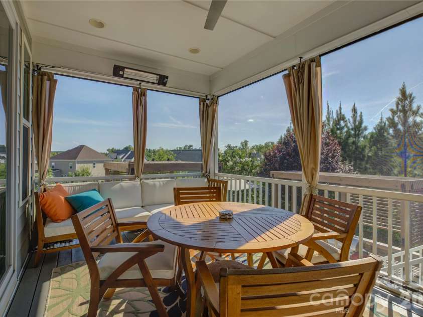 14219 Twin Eagles Lane, Charlotte, NC 28278.  MLS# CAR4418745, YatesRealty ID 48122. Screened in deck over looking the backyard