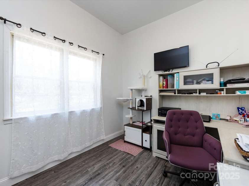 7545 Brancy Street, Kannapolis, NC 28081.  MLS# CAR4242395, YatesRealty ID 4813. Office with a ton of natural light and vinyl plank flooring