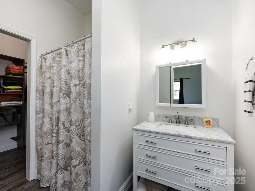 7545 Brancy Street, Kannapolis, NC 28081.  MLS# CAR4242395, YatesRealty ID 4813. Private bath attached to bedroom 4, granite countertop sink with shower and walk in closet