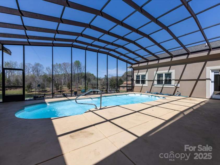 7545 Brancy Street, Kannapolis, NC 28081.  MLS# CAR4242395, YatesRealty ID 4813. Stunning screened in Lanai and Inground Pool