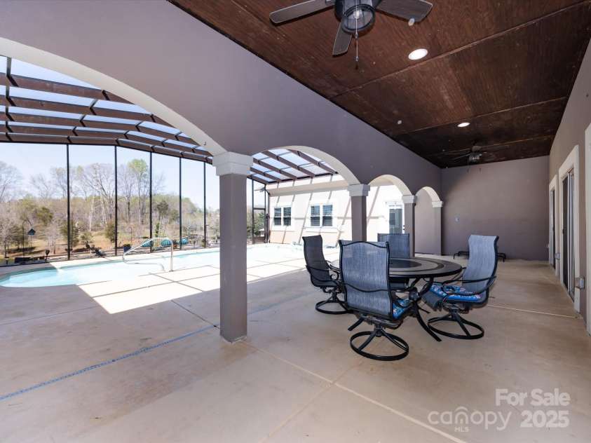 7545 Brancy Street, Kannapolis, NC 28081.  MLS# CAR4242395, YatesRealty ID 4813. Stunning screened in Lanai and Inground Pool