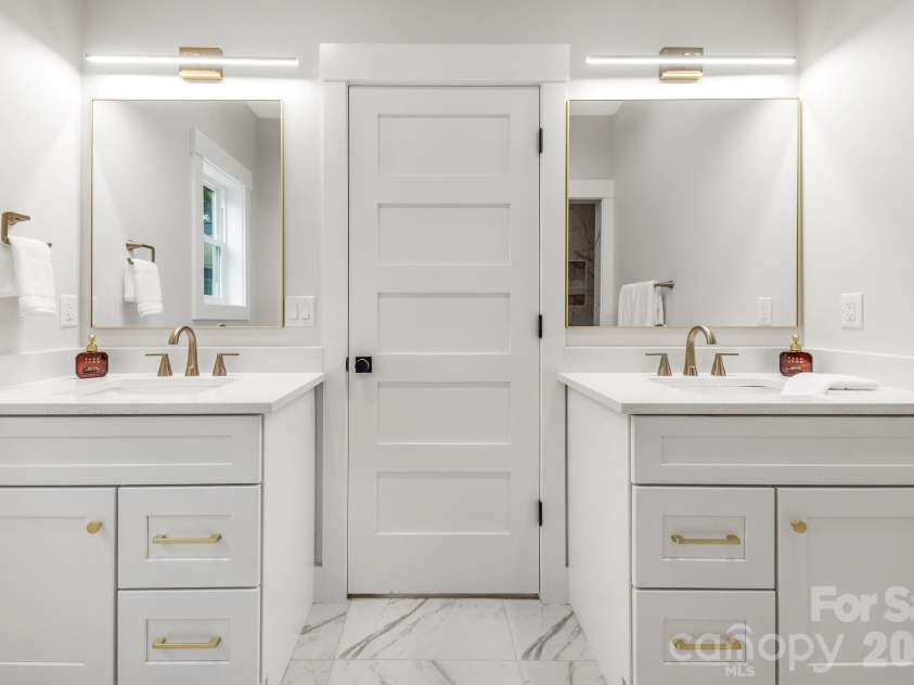 447 Blooming Laurel Drive, Hendersonville, NC 28792.  MLS# CAR4416283, YatesRealty ID 48140. Ensuite Bath with Separate Vanities