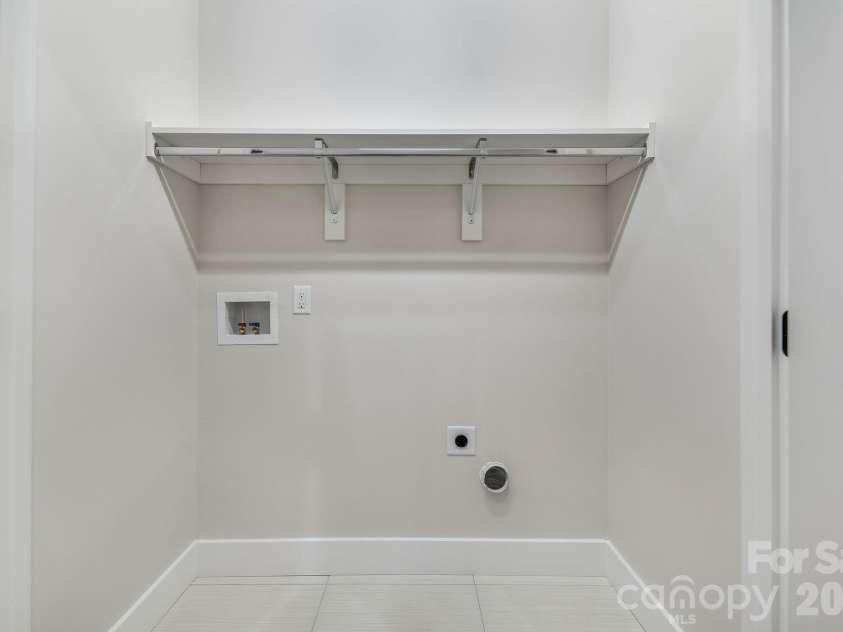447 Blooming Laurel Drive, Hendersonville, NC 28792.  MLS# CAR4416283, YatesRealty ID 48140. Main Level Laundry Closet