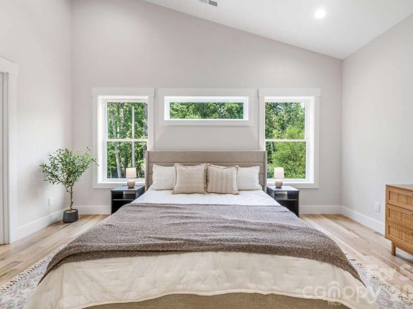 447 Blooming Laurel Drive, Hendersonville, NC 28792.  MLS# CAR4416283, YatesRealty ID 48140. Thoughtfully Placed Windows for Ideal Light and Privacy