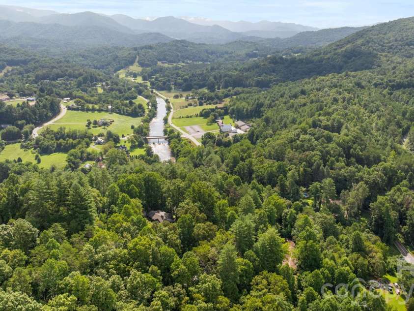 103 Riverwood Drive, Sylva, NC 28779.  MLS# CAR4420195, YatesRealty ID 48144. Aerial View & Tuckasegee river
