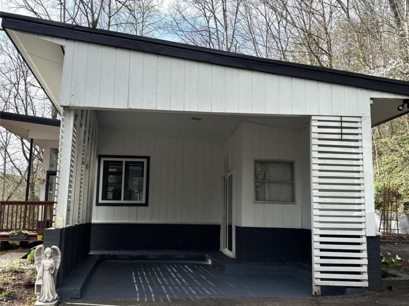 103 Riverwood Drive, Sylva, NC 28779.  MLS# CAR4420195, YatesRealty ID 48144. Carport