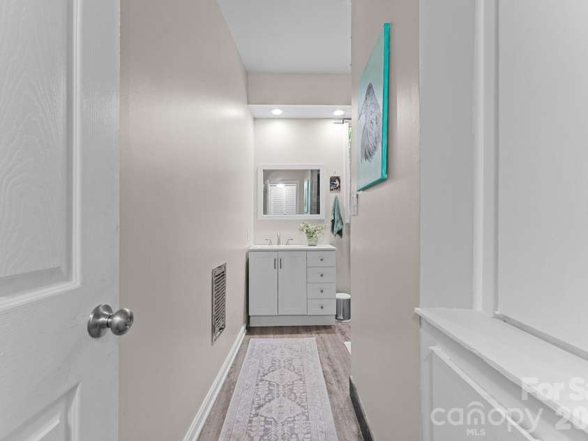 103 Riverwood Drive, Sylva, NC 28779.  MLS# CAR4420195, YatesRealty ID 48144. Hall Bathroom