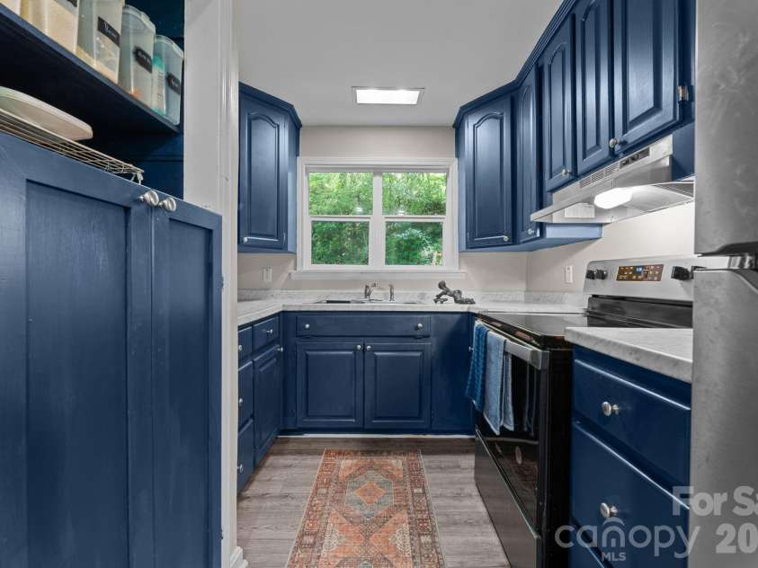 103 Riverwood Drive, Sylva, NC 28779.  MLS# CAR4420195, YatesRealty ID 48144. Lovely kitchen