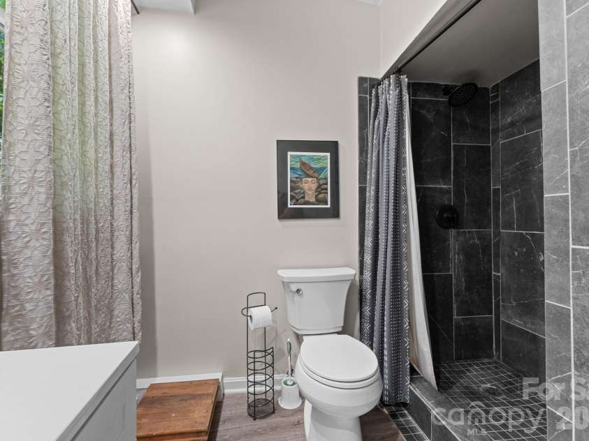 103 Riverwood Drive, Sylva, NC 28779.  MLS# CAR4420195, YatesRealty ID 48144. Remodeled Hall Bathroom