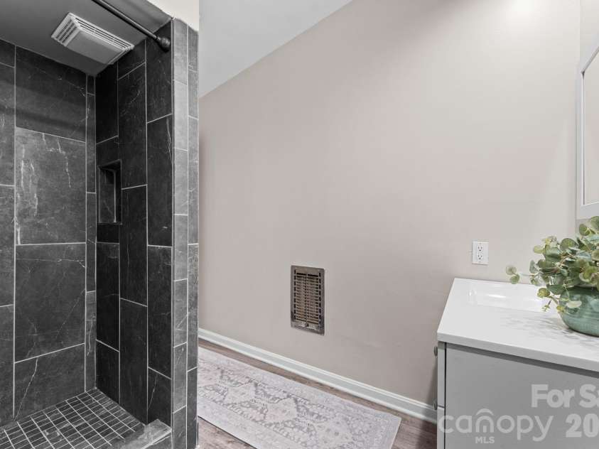103 Riverwood Drive, Sylva, NC 28779.  MLS# CAR4420195, YatesRealty ID 48144. Remodeled Hall Bathroom