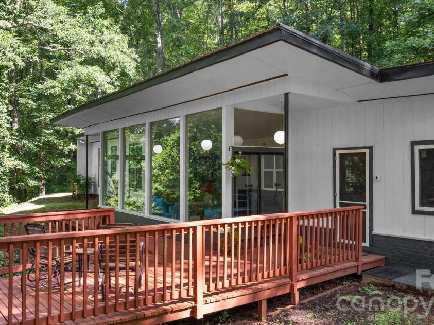 103 Riverwood Drive, Sylva, NC 28779.  MLS# CAR4420195, YatesRealty ID 48144. The Front Deck and Entrance to the Kitchen