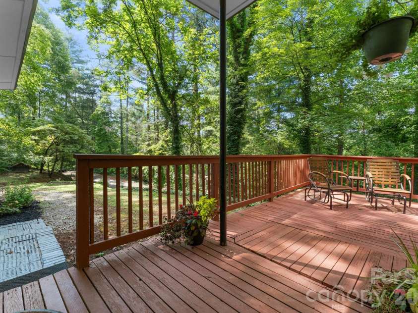 103 Riverwood Drive, Sylva, NC 28779.  MLS# CAR4420195, YatesRealty ID 48144. View from the Front Deck toward parking area