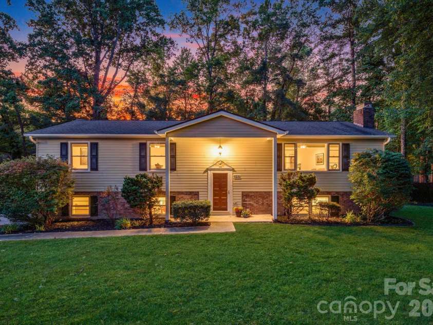 129 Whisperwood Drive, Hendersonville, NC 28791.  MLS# CAR4419413, YatesRealty ID 48149. 