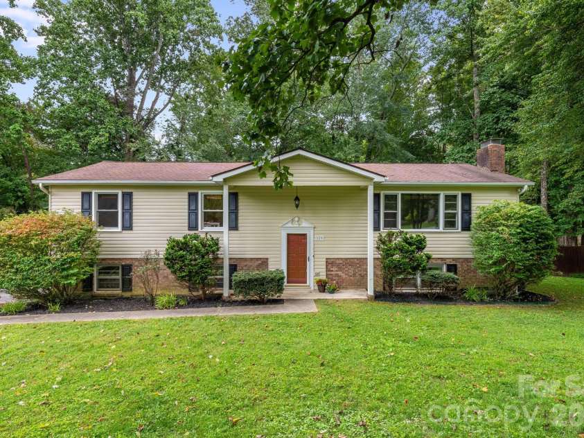 129 Whisperwood Drive, Hendersonville, NC 28791.  MLS# CAR4419413, YatesRealty ID 48149. 