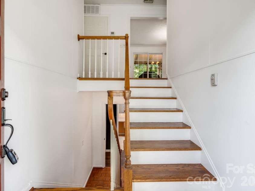 129 Whisperwood Drive, Hendersonville, NC 28791.  MLS# CAR4419413, YatesRealty ID 48149. 