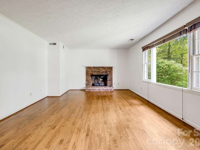 129 Whisperwood Drive, Hendersonville, NC 28791.  MLS# CAR4419413, YatesRealty ID 48149. 