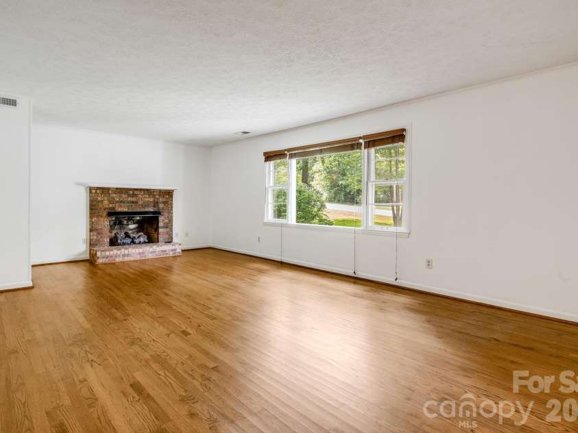 129 Whisperwood Drive, Hendersonville, NC 28791.  MLS# CAR4419413, YatesRealty ID 48149. 