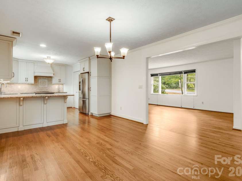 129 Whisperwood Drive, Hendersonville, NC 28791.  MLS# CAR4419413, YatesRealty ID 48149. 