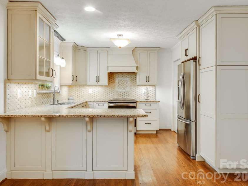 129 Whisperwood Drive, Hendersonville, NC 28791.  MLS# CAR4419413, YatesRealty ID 48149. 