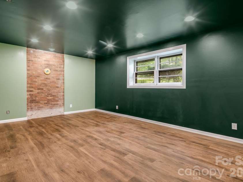 129 Whisperwood Drive, Hendersonville, NC 28791.  MLS# CAR4419413, YatesRealty ID 48149. 
