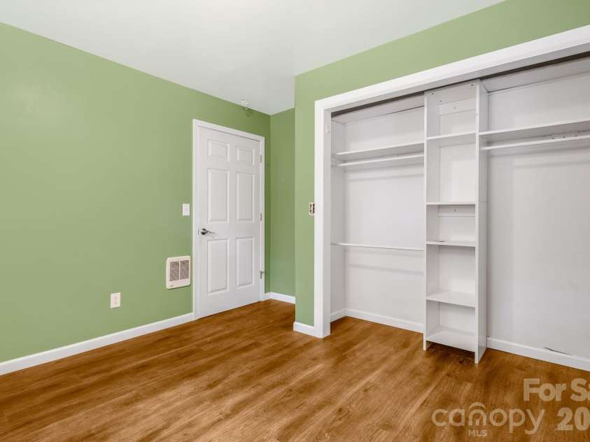 129 Whisperwood Drive, Hendersonville, NC 28791.  MLS# CAR4419413, YatesRealty ID 48149. 