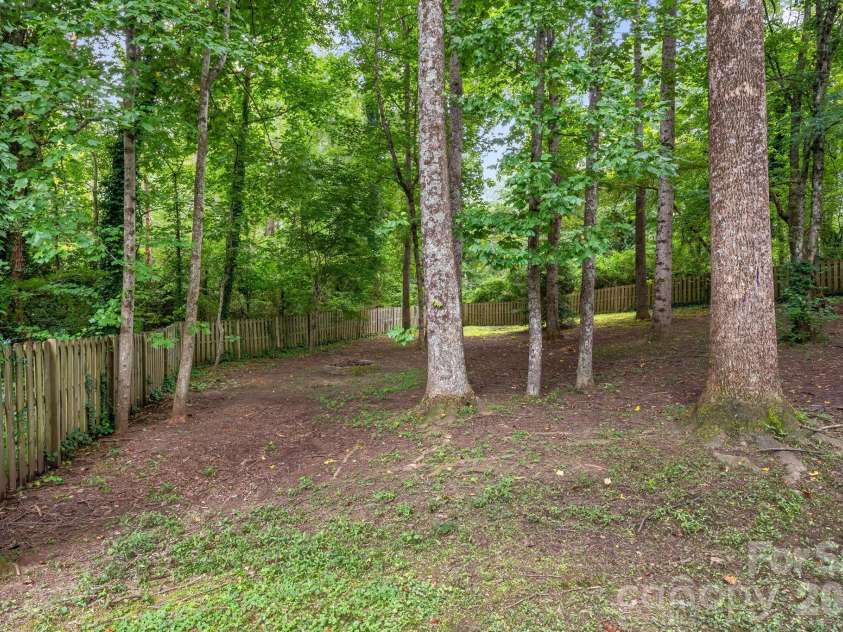 129 Whisperwood Drive, Hendersonville, NC 28791.  MLS# CAR4419413, YatesRealty ID 48149. 