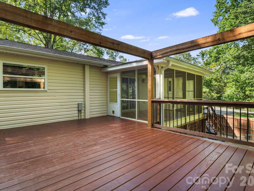 129 Whisperwood Drive, Hendersonville, NC 28791.  MLS# CAR4419413, YatesRealty ID 48149. 