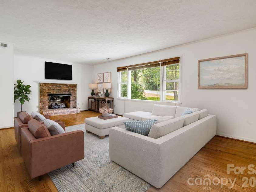 129 Whisperwood Drive, Hendersonville, NC 28791.  MLS# CAR4419413, YatesRealty ID 48149. Virtually staged
