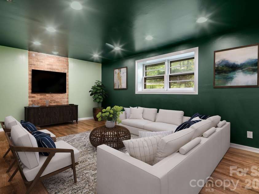 129 Whisperwood Drive, Hendersonville, NC 28791.  MLS# CAR4419413, YatesRealty ID 48149. Virtually staged