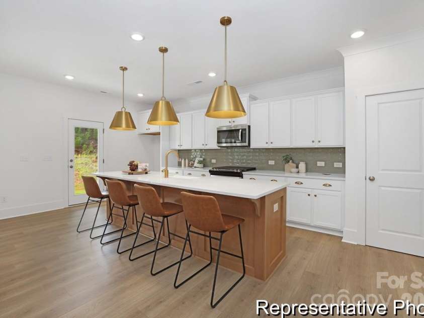 423 Whispering Hills Drive, Locust, NC 28097.  MLS# CAR4346686, YatesRealty ID 4816. 