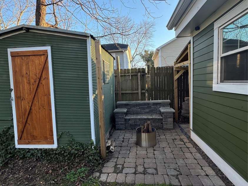506 Campus Street, Charlotte, NC 28216.  MLS# CAR4217971, YatesRealty ID 4816. Shed and fire pit area!