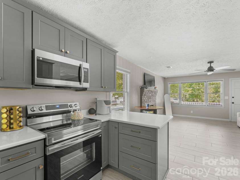71 Harvey Osteen Road, Zirconia, NC 28790.  MLS# CAR4418072, YatesRealty ID 48166. Unit 1 Kitchen, NEW!